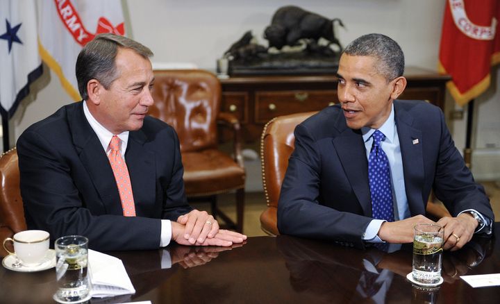 WASHINGTON - NOVEMBER 16: U.S. President Barack Obama (R) sits with Speaker of the House John Boehner (R-OH) during a meeting with bipartisan group of congressional leaders in the Roosevelt Room of the White House on November 16, 2012 in Washington, DC. Obama and congressional leaders of both parties are meeting to reportedly discuss deficit reduction before the tax increases and automatic spending cuts go into affect in the new year. (Photo by Olivier Douliery-Pool/Getty Images)