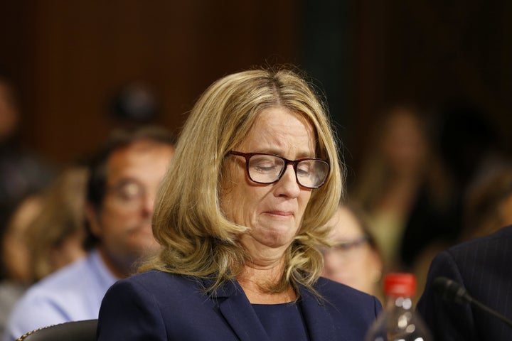 Christine Blasey Ford, overcome with emotion, gives her testimony before the Senate Judiciary Committee on Thursday.