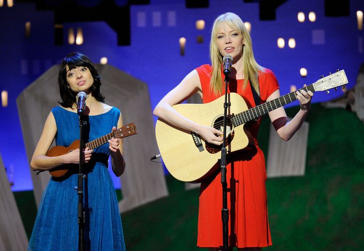 SANTA MONICA, CA - FEBRUARY 25: Musicians Kate Micucci (L) and Riki Lindhome of the musical group Garfunkel and Oates peform onstage at the 2012 Film Independent Spirit Awards held at the Santa Monica Pier on February 25, 2012 in Santa Monica, California. (Photo by Kevork Djansezian/Getty Images)
