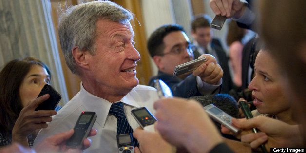 UNITED STATES - APRIL 9: Sen. Max Baucus, D-Mt., is interviewed by the press before the Senate policy luncheons in the Capitol. The parents of the Newtown shooting victims are on Capitol Hill this week, lobbying to support a vote on the current proposals of gun background checks. (Photo By Chris Maddaloni/CQ Roll Call)