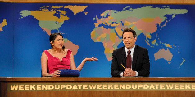 SATURDAY NIGHT LIVE -- 'Zach Galifianakis' Episode 1639 -- Pictured: (l-r) Cecily Strong with Seth Meyers during a skit on May 4, 2013 -- (Photo by: Dana Edelson/NBC/NBCU Photo Bank via Getty Images)