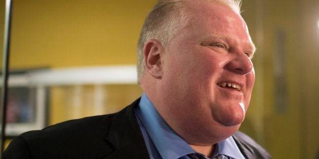 TORONTO, ON - NOVEMBER 15 - Toronto Mayor Rob Ford leaves his office for the day on November 15, 2013. (Carlos Osori