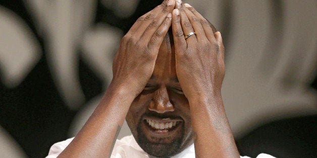 Kanye West American rapper, songwriter, record producer, film director, entrepreneur, and fashion designer, Kanye West attends the Cannes Lions 2014, 61st International Advertising Festival in Cannes, southern France, Tuesday, June 17, 2014. The Cannes Lions International Advertising Festival is a world's meeting place for professionals in the communications industry.(AP Photo/Lionel Cironneau)