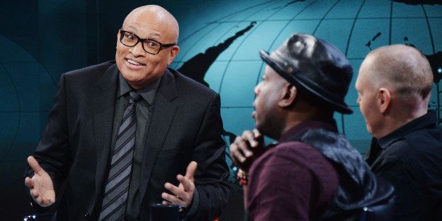 NEW YORK, NY - JANUARY 19: (L-R) Host Larry Wilmore, hip-hop artist/activist Talib Kweli, and comedian Bill Burr appear on the debut episode of Comedy Central's 'The Nightly Show with Larry Wilmore' at The Nightly Show Studios on January 19, 2015 in New York City. (Photo by Stephen Lovekin/Getty Images for Comedy Central)