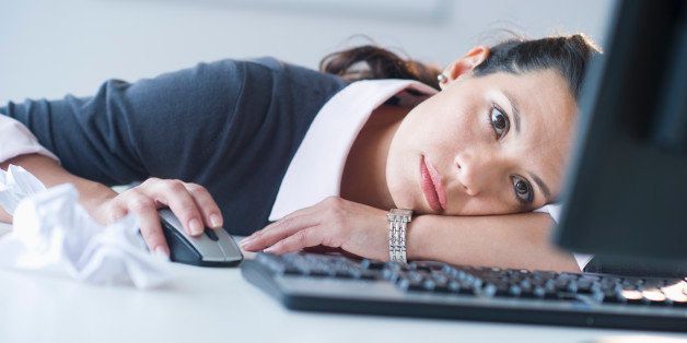 USA, New Jersey, Jersey City, Businesswoman in front of computer, looking tired