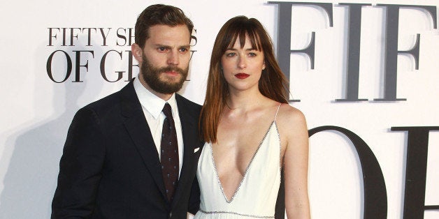 LONDON, UNITED KINGDOM - FEBRUARY 12: Jamie Dornan and Dakota Johnson attends the UK Premiere of 'Fifty Shades Of Grey' at Odeon Leicester Square on February 12, 2015 in London, England. (Photo by Fred Duval/FilmMagic)