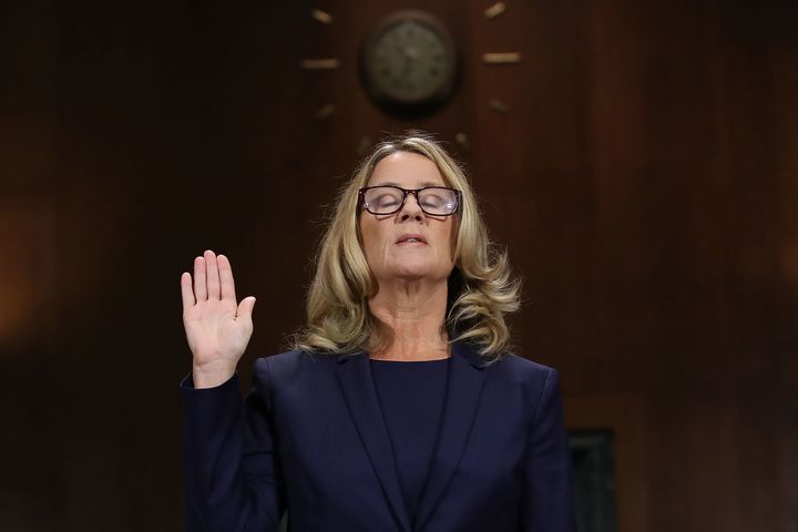 Christine Blasey Ford is sworn in before testifying before the Senate Judiciary Committee on Thursday.