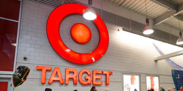 IMAGE DISTRIBUTED FOR TARGET - Guests line up outside Target as they wait for the Black Friday sale to begin, Thursday, November 27, 2014, in the Harlem neighborhood of New York. (John Minchillo/AP Images for Target)