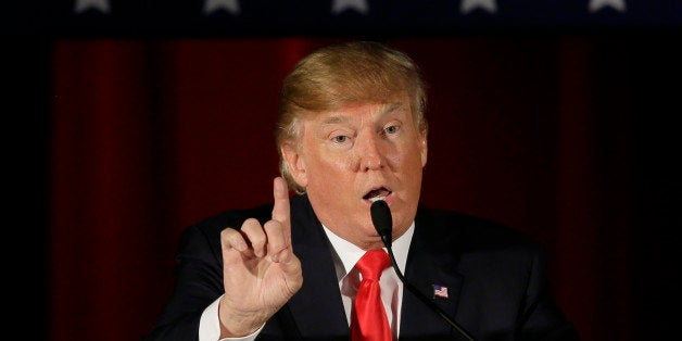 Republican presidential candidate Donald Trump speaks during a campaign rally at the Veterans Memorial Building, Saturday, Dec. 19, 2015, in Cedar Rapids, Iowa. (AP Photo/Charlie Neibergall)