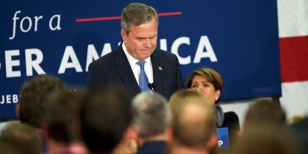 COLUMBIA, SC - FEBRUARY 20: Jeb Bush reacts as he announces the suspension of his presidential campaign at an election night party at the Hilton Columbia Center in Columbia, SC on February 20, 2016. Donald Trump won decisively in the South Carolina Republican Presidential Primary, the 'first in the south.' (Photo by Mark Makela/Getty Images)