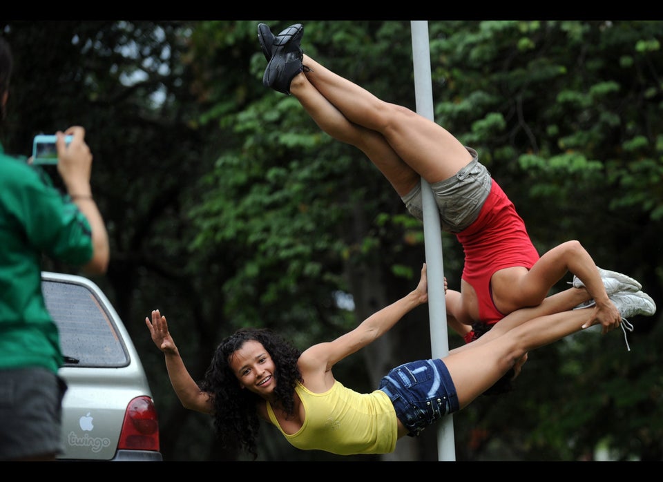 Colombian Women Go Pole Dancing In The Streets