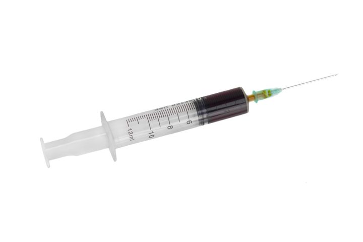 disposable syringe with dark...