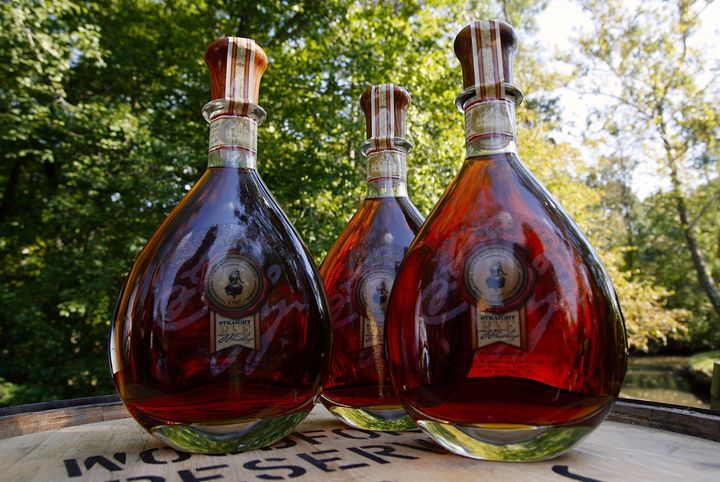 MOUNT VERNON, VA - SEPTEMBER 27: Bottles of freshly produced limited edition whiskey are shown off prior to the dedication ceremony for the newly restored George Washington Distillery September 27, 2006 in Mount Vernon, Virginia. Prince Andrew, Duke of York joined public officials at historic Mount Vernon to celebrate the official dedication of the distillery. Built on the exact site of the orginal, the distillery was rebuilt using the historical plans used in the 1797 building and will open to the public in April 2007. (Photo by Win McNamee/Getty Images)