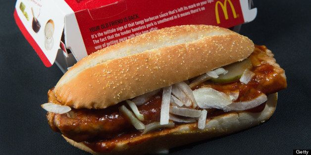 TO GO WITH AFP STORY US-FOOD-SOCIETY-MCDONALD'S A photo of a McDonalds' McRib sandwich, November 2, 2010. Fast food giant McDonald's is bringing back a sandwich -- the McRib -- that gained cult acclaim over the last three decades, in a move lauded by fans known to travel great distances in the hunt for the coveted treat.The boneless pork chop between a bun and slathered with tangy BBQ sauce, topped with onions and pickles, was first launched in 1981, and with rare exceptions has only been offered for sale in select McDonald's for a few weeks at a time. From Tuesday, it will be available nationwide, and for an entire month. AFP Photo/Paul J. Richards (Photo credit should read PAUL J. RICHARDS/AFP/Getty Images)