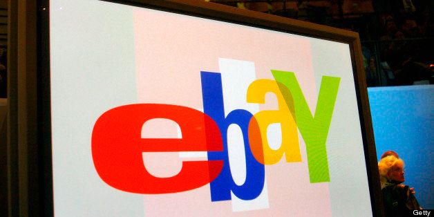 BERLIN, GERMANY - SEPTEMBER 27: A large monitor display the Ebay logo as fans watch entertainers at an Ebay Live event on September 27, 2003 in Berlin, Germany. Ebay Germany held an Ebay Live event, where several thousand buyers and sellers converge for day long seminars, pep rallies and a night of music and dancing. Germany is Ebay's second biggest market after the US. (Photo by Kurt Vinion/Getty Images) 
