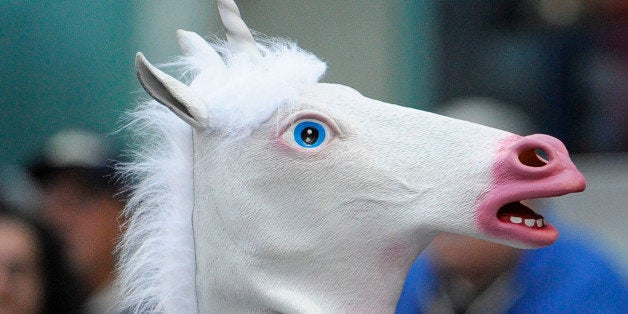 SAN DIEGO, CA - JUNE 02: A fan wearing a horse head mask takes a picture before an interleague game between the Toronto Blue