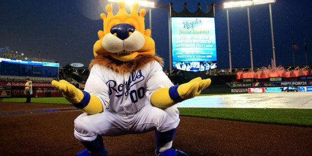 KANSAS CITY, MO - JULY 03: Kansas City Royals mascot Sluggerrr entertains fans during a rain delay prior to the game between the Cleveland Indians and the Kansas City Royals at Kauffman Stadium on July 3, 2013 in Kansas City, Missouri. (Photo by Jamie Squire/Getty Images)