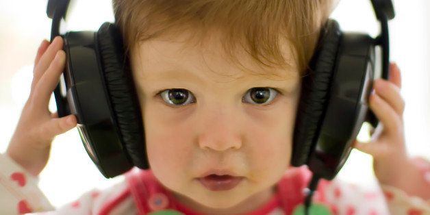 Young girl listening to headphones