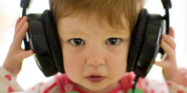 Young girl listening to headphones