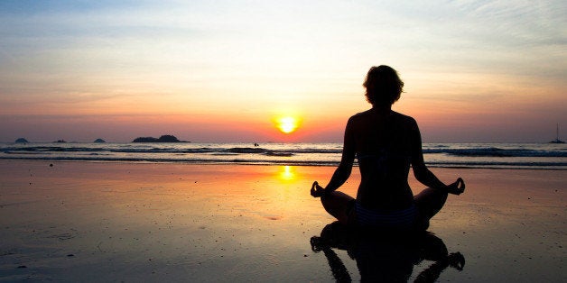 silhouette yoga woman sitting...