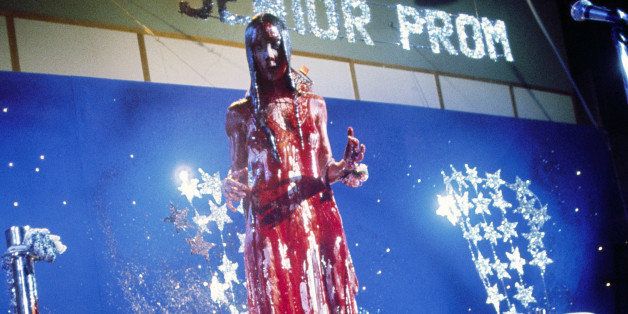 Drenched in pig's blood, Carrie White, played by Sissy Spacek, stares in shock at her ill-fated prom date, Tommy, played by William Katt, in Brian De Palma's horror film 'Carrie', 1976. (Photo by Silver Screen Collection/Getty Images)