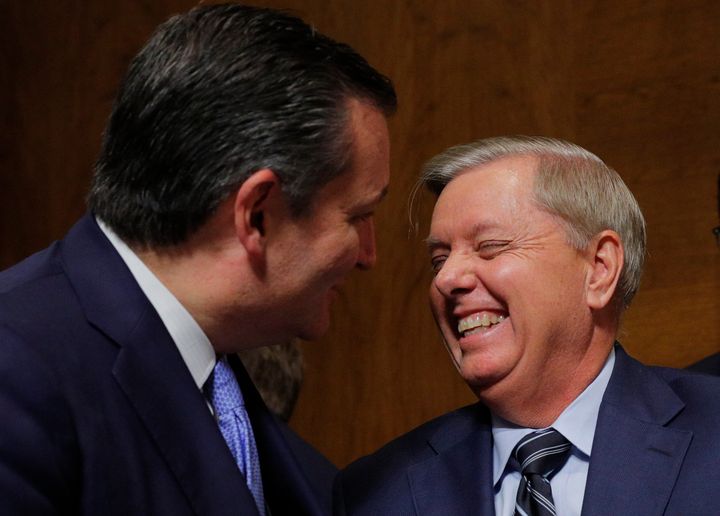 Sen. Lindsey Graham (R-S.C.) laughs with Sen. Ted Cruz (R-Texas) at the conclusion of testimony from Supreme Court nominee Brett Kavanaugh and Dr. Christine Blasey Ford, who accuses Kavanaugh of sexually assaulting her.