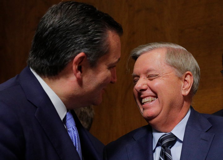 Sen. Lindsey Graham (R-S.C.) laughs with Sen. Ted Cruz (R-Texas) at the conclusion of testimony from Supreme Court nominee Br