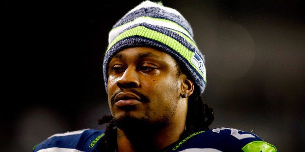 SEATTLE, WA - JANUARY 10: Marshawn Lynch #24 of the Seattle Seahawks looks on against the Carolina Panthers during the 2015 NFC Divisional Playoff game at CenturyLink Field on January 10, 2015 in Seattle, Washington. (Photo by Jonathan Ferrey/Getty Images)