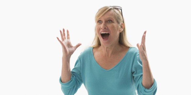 Caucasian woman cheering