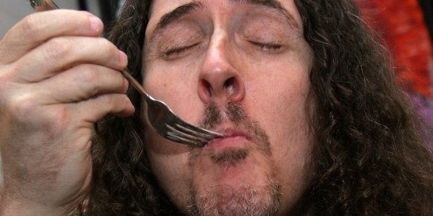 LOS ANGELES, CA - NOVEMBER 20: Musician Weird Al Yankovic poses with the Mrs. Smith display backstage at the American Music Awards with distinctive assets held at the Shrine Auditorium on Novmber 20, 2006 in Los Angeles, California. (Photo by Marsaili McGrath/Getty Images)