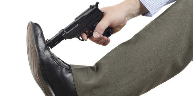 Image result for man shooting self in foot