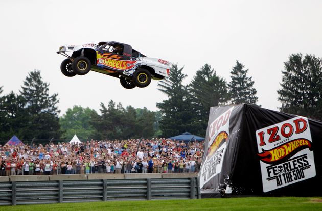 tanner foust jumps hot wheels truck 332 feet breaks world record huffpost tanner foust jumps hot wheels truck 332