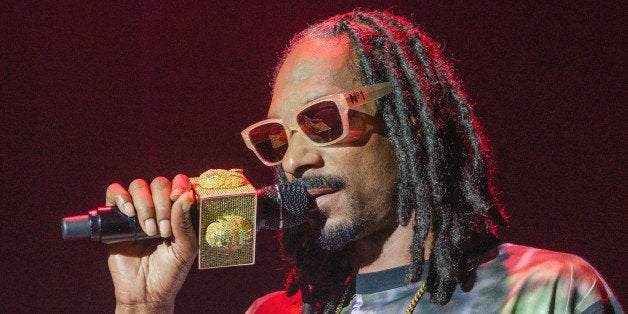 WESTBURY, NY - JULY 08: Snoop Dogg performs in concert at The Space at Westbury on July 8, 2014 in Westbury, New York. (Photo by Mike Pont/Getty Images)