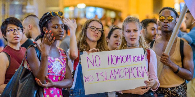 GRAND CENTRAL STATION, NEW YORK, UNITED STATES - 2016/06/18: A group of about 200 people held a rally at Grand Central Station where the names of the Orlando shootout victims were read, the group then marched down Seventh Avenue to the Stonewall Inn on the West Village were a 10 minute silence were held in memory of The Pulse victims. The group wants to raise awareness about stopping the homophobia and islamophobia outcomes created by this incident. (Photo by Erik McGregor/Pacific Press/LightRocket via Getty Images)