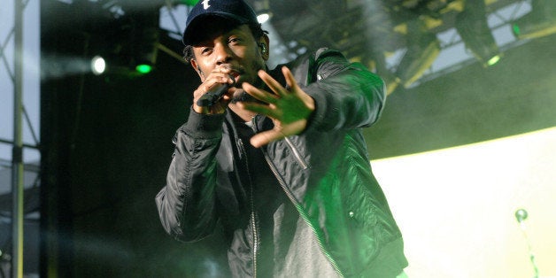 CLEVELAND, OH - OCTOBER 30: Recording Artist Kendrick Lamar performs before a game between the New York Knicks and Cleveland Cavaliers on October 30, 2014 in Cleveland, Ohio. NOTE TO USER: User expressly acknowledges and agrees that, by downloading and/or using this photograph, user is consenting to the terms and conditions of the Getty Images License Agreement. Mandatory Copyright Notice: Copyright 2012 NBAE (Photo by Tony Morrison/NBAE via Getty Images)