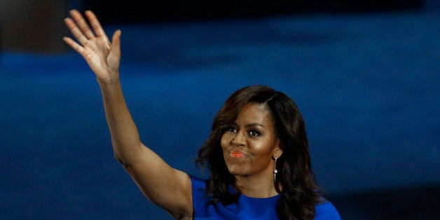U.S. First Lady Michelle Obama waves after her speech at the Democratic National Convention in Philadelphia, Pennsylvania, U.