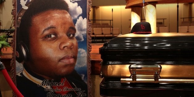 ST. LOUIS, MO - AUGUST 25: The casket of Michael Brown sits inside Friendly Temple Missionary Baptist Church awaiting the start of his funeral on August 25, 2014 in St. Louis Missouri. Michael Brown,18 year-old unarmed teenager, was shot and killed by a Ferguson Police Officer Darren Wilson in the nearby town of Ferguson, Missouri on August 9. His death caused several days of violent protests along with rioting and looting in Ferguson. (Photo by Robert Cohen-Pool/Getty Images)