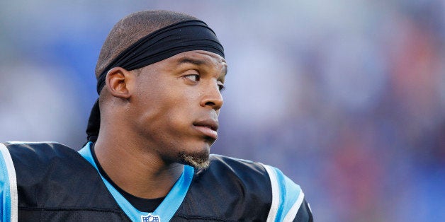 BALTIMORE, MD - AUGUST 11: Cam Newton #1 of the Carolina Panthers looks on before the start of a preseason NFL game against t