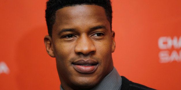 Actor Nate Parker poses at the premiere of "Arbitrage" at the 2012 Sundance Film Festival in Park City, Utah on Saturday, Jan. 21, 2012. (AP Photo/Danny Moloshok)