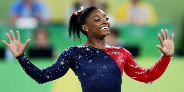 RIO DE JANEIRO, BRAZIL - AUGUST 07: Simone Biles of the United States competes on the floor during Women's qualification for Artistic Gymnastics on Day 2 of the Rio 2016 Olympic Games at the Rio Olympic Arena on August 7, 2016 in Rio de Janeiro, Brazil (Photo by Ezra Shaw/Getty Images)