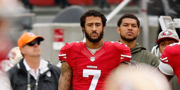 SANTA CLARA, CA - NOVEMBER 08: Colin Kaepernick #7 of the San Francisco 49ers watches Blaine Gabbert #2 play quarterback dur