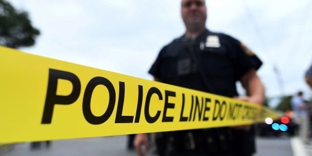 Law enforcement officers secure the area where they allegedly arrested terror suspect Ahmad Khan Rahami following a shootout in Linden, New Jersey, on September 19, 2016.16An 'armed and dangerous' Afghan-born suspect wanted in the weekend bomb attacks in New York and New Jersey was wounded Monday in a shootout with police and taken into custody. Federal investigators released a mugshot of 28-year-old Ahmad Khan Rahami, who has brown hair, brown eyes and a brown beard, saying he was last known to live in Elizabeth, a town adjacent to Newark International Airport. / AFP / Jewel SAMAD (Photo credit should read JEWEL SAMAD/AFP/Getty Images)