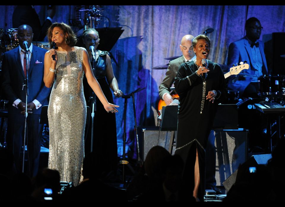 Singers Whitney Houston (L) and Dionne W