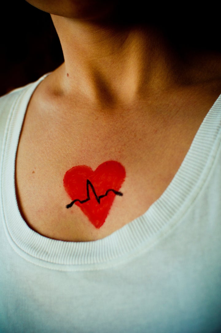 Painted on heart and ECG trace.