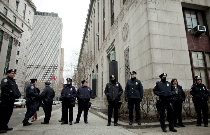 NEW YORK, NY - MARCH 18: New York CIty Police officers stand near a demonstration against the city's 'stop and frisk' search