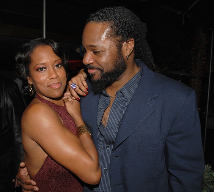 HOLLYWOOD - NOVEMBER 12: Actors Regina King (L) and Malcolm-Jamal Warner attend the after party following the premiere of Screen Gems 'This Christmas' on November 12, 2007 in Hollywood, California. (Photo by Stephen Shugerman/Getty Images)