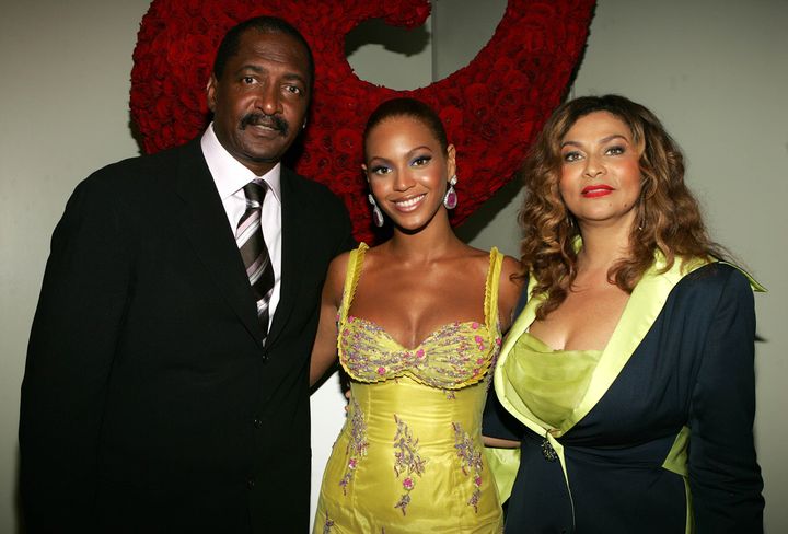 NEW YORK - JUNE 23: (EXCLUSIVE) (L-R) Singer Beyonce Knowles (C) poses with her father and manager Matthew Knowles and her mother Tina Knowles at the 'Beyonce: Beyond the Red Carpet auction presented by Beyonce and her mother Tina Knowles along with the House of Dereon to benefit the VH1 Save The Music Foundation June 23, 2005 in New York City. The exhibition will showcase 18-24 costumes worn by Beyonce chronicling her film, television and video appearances. (Photo by Frank Micelotta/Getty Images)