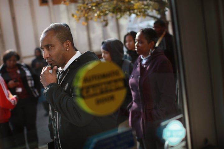 CHICAGO, IL - NOVEMBER 09: Job seekers wait in line outside Kennedy-King College to attend a job fair hosted by the city of Chicago on November 9, 2012 in Chicago, Illinois. Thousands of people waited in line beginning at 3AM for the job fair which did not open the doors until 9AM. When the doors opened the line was approximately a half-mile long. (Photo by Scott Olson/Getty Images)