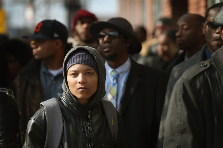 CHICAGO, IL - NOVEMBER 09: Job seekers wait in line at Kennedy-King College to attend a job fair hosted by the city of Chicago on November 9, 2012 in Chicago, Illinois. Thousands of people waited in line beginning at 3AM for the job fair which did not open the doors until 9AM. When the doors opened the line was approximately a half-mile long. (Photo by Scott Olson/Getty Images)