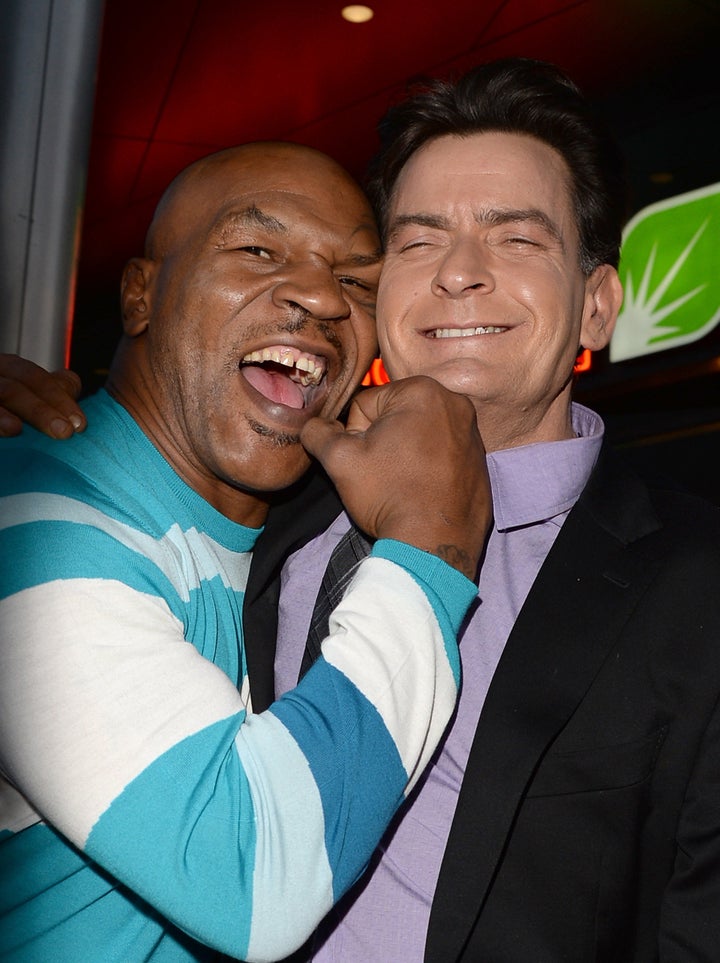 HOLLYWOOD, CA - APRIL 11: Actors Mike Tyson and Charlie Sheen arrive at the Dimension Films' 'Scary Movie 5' premiere at the ArcLight Cinemas Cinerama Dome on April 11, 2013 in Hollywood, California. (Photo by Jason Merritt/Getty Images)